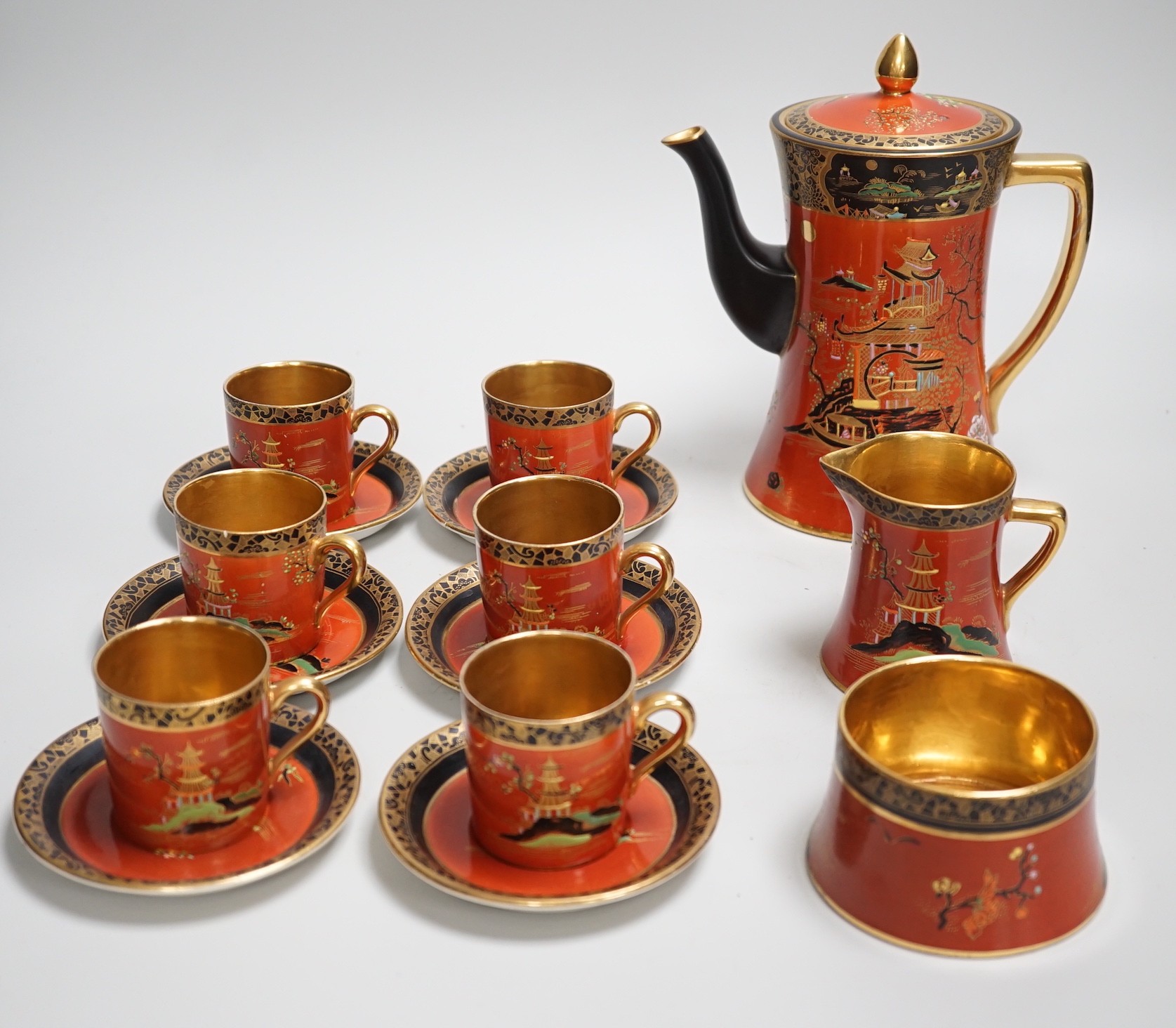 A Carltonware Japanese style coffee set: base marked 2880, coffee pot and cover 19.5 cms high